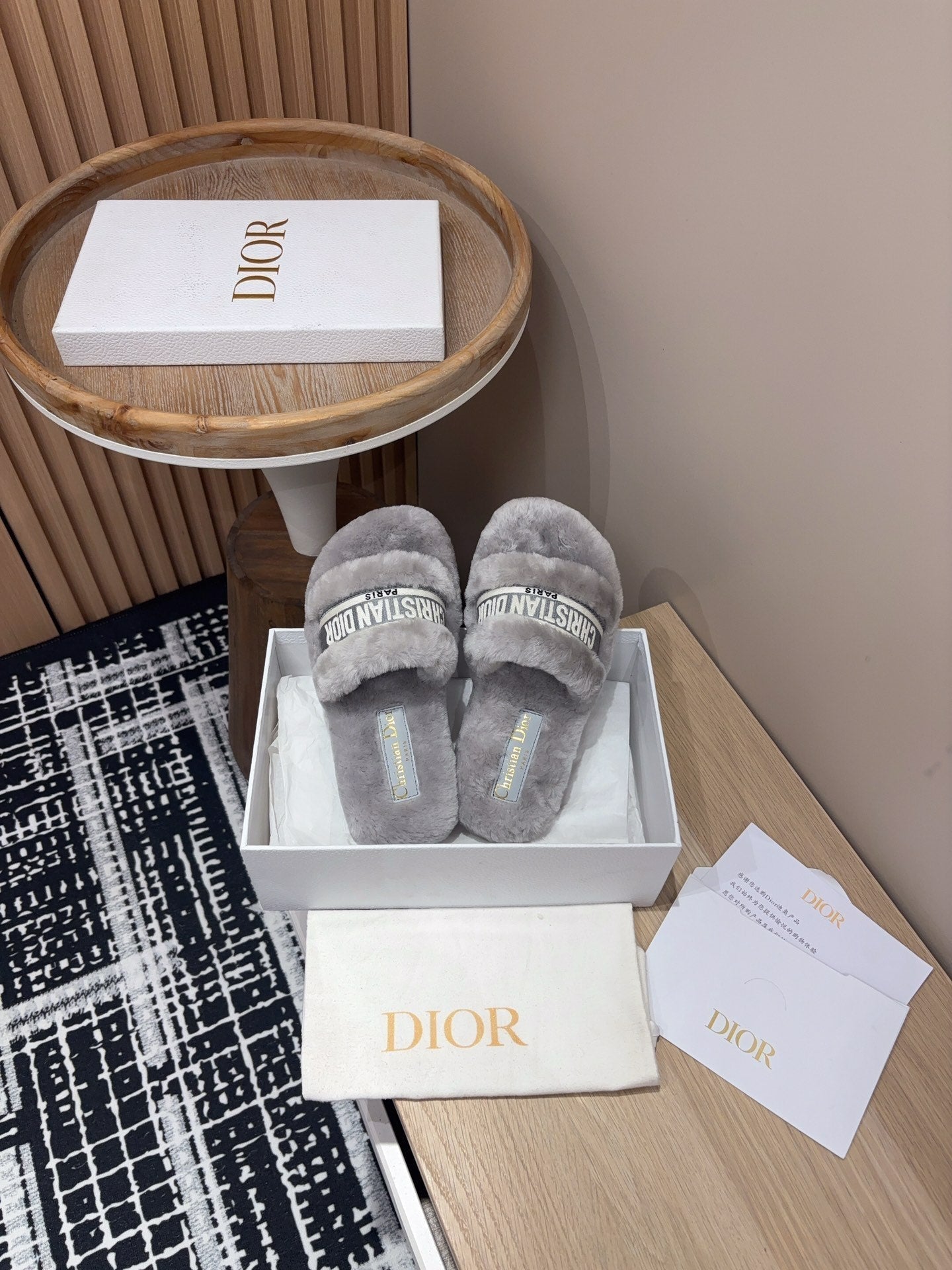 DIOR THICK-SOLE SLIPPERS IN PALE GRAY SHEARLING WITH EMBROIDERED LOGO