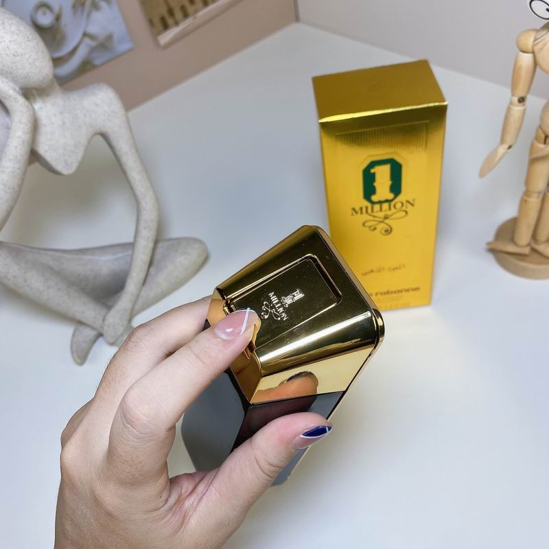 Paco Rabanne 1 Million Golden Oud gold bar bottle front view on white desk