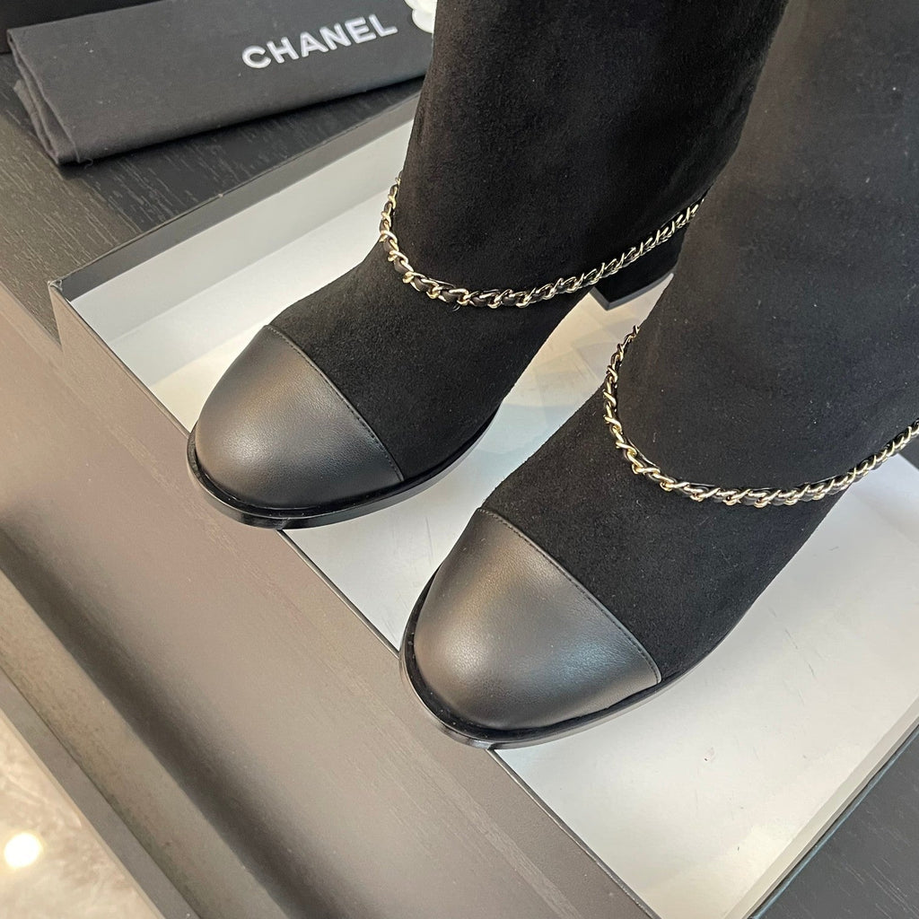 CHANEL SHORT BOOTS 6.5 CM IN BLACK SUEDE AND CALFSKIN