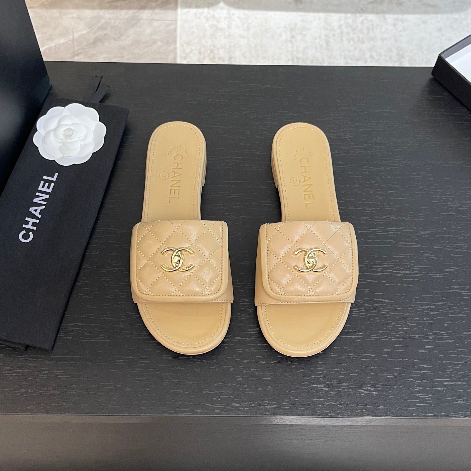 CHANEL FLAT MULE IN TUSCAN BEIGE LAMBSKIN