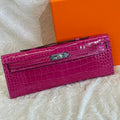 HERMES KELLY CUT 31 IN MAGENTA PURPLE SHINNY ALLIGATOR LEATHER WITH SILVER HARDWARE
