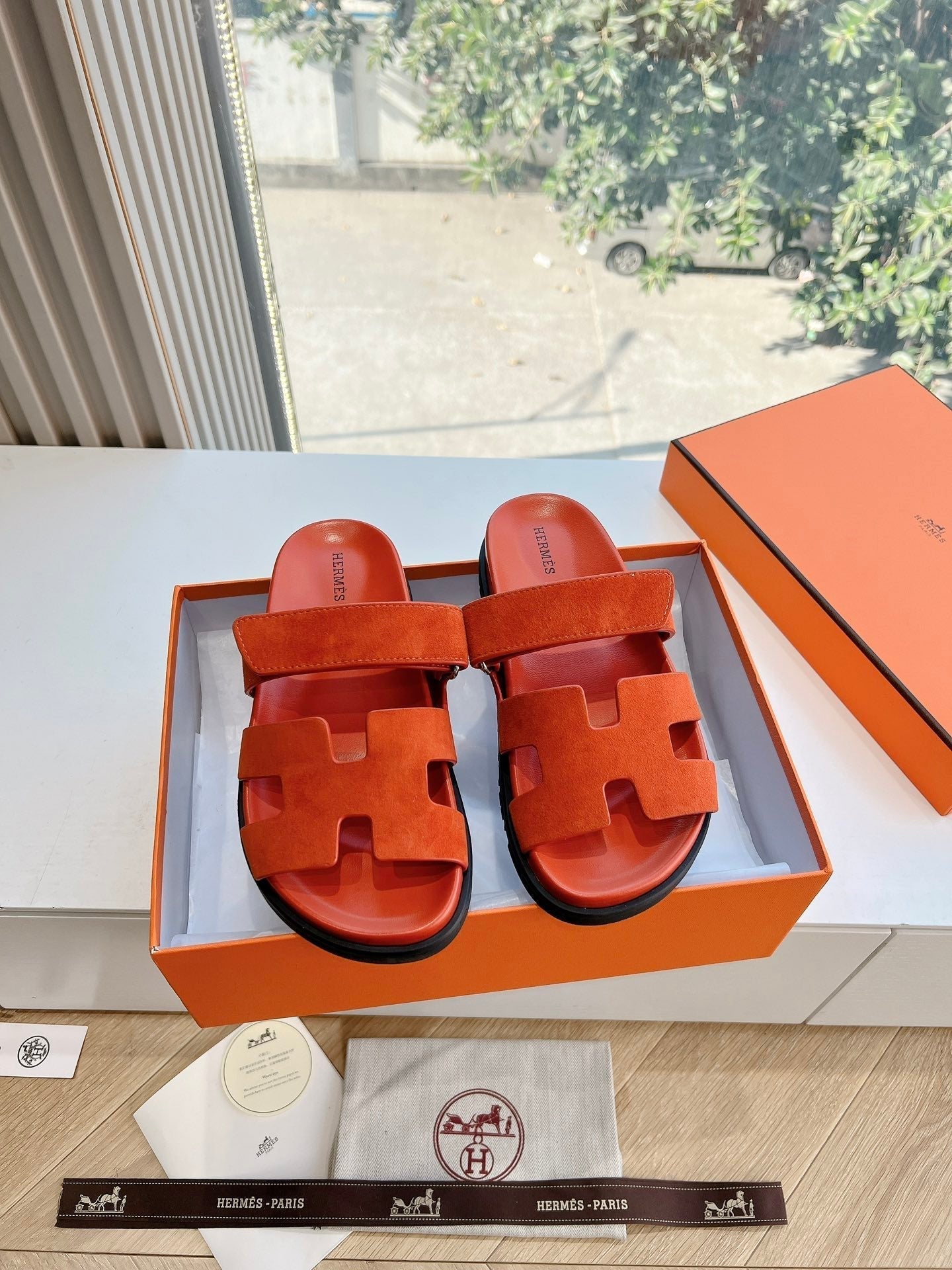HERMES CHYPRE SANDAL IN FIRE ORANGE SUEDE